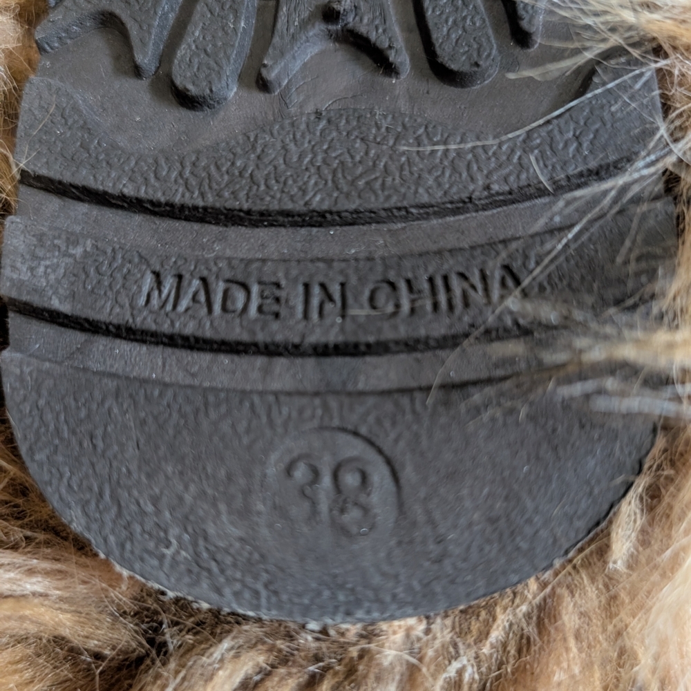 faux fur boots, often referred to as "yeti boots" or "fluffy boots". - Picture 6 of 6